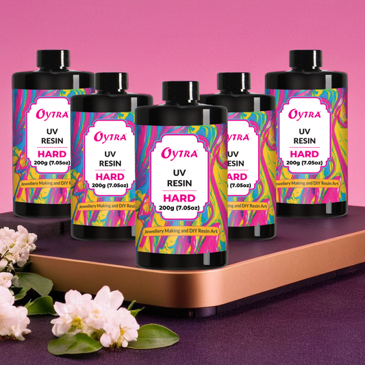 Oytra UV Curing Resin 1 kg pack, non-toxic and ultra-clear with a glossy finish cures in 5–10 minutes under UV light, jewelry, and craft decoration