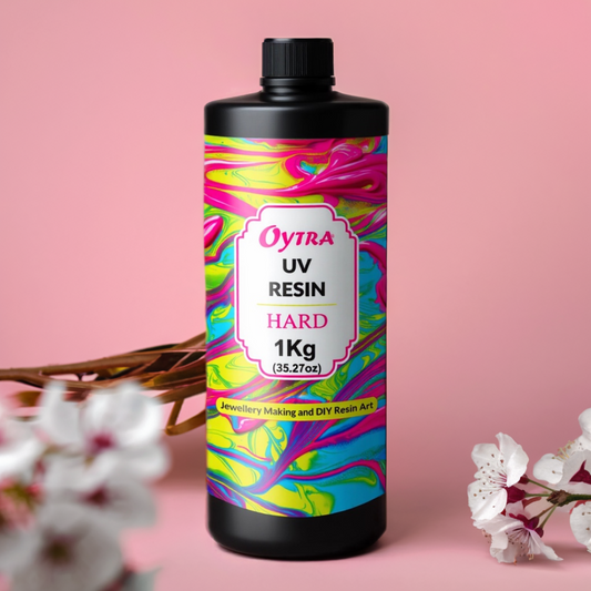 Oytra 1 kg Crystal Clear UV Resin ready-to-use, fast-curing formula ideal for jewelry making, keychains, coating, casting, and small DIY resin crafts with a glossy, non-yellowing finish