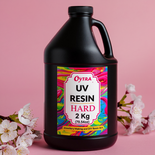 Oytra 2 kg Crystal Clear UV Resin ready-to-use, fast-curing under UV light, ideal for jewelry making, casting, coating, keychains, and DIY crafts with a smooth, non-yellowing finish