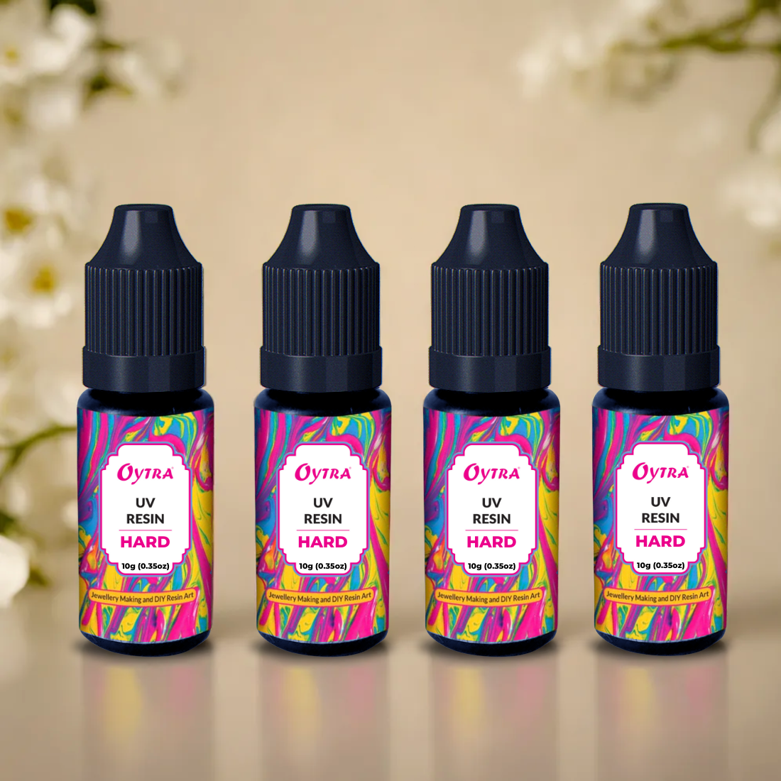 Oytra UV Curing Resin set with 4 x 10 g bottles non-toxic, ultra-clear, glossy finish cures in 5–10 minutes under any UV light, perfect for polymer clay and small DIY crafts